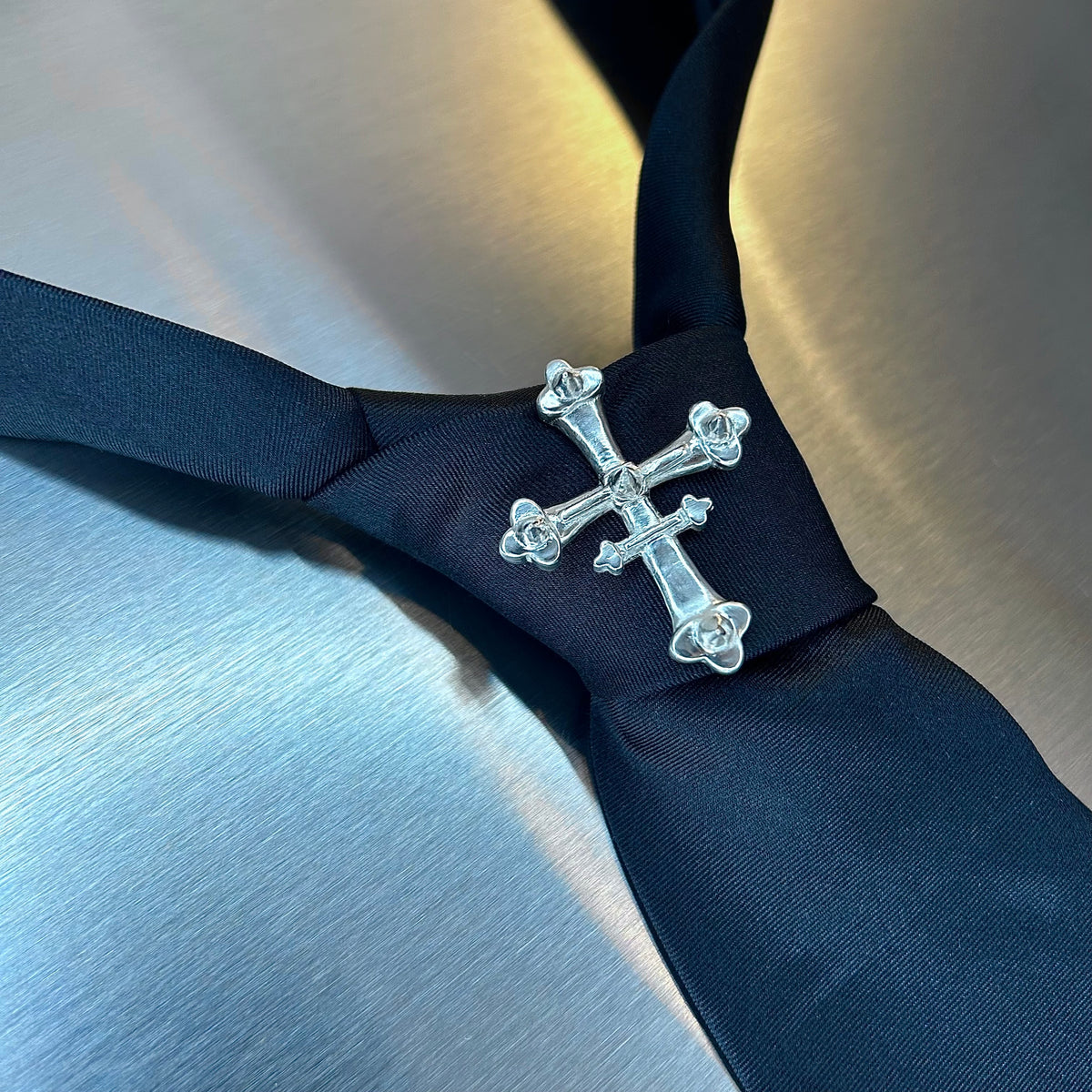 The Cruciform Tie Adornment
